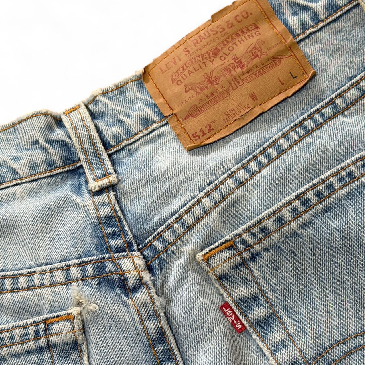 Vintage 90s Levi’s 512 High Waisted Light Blue Denim Tapered Jeans